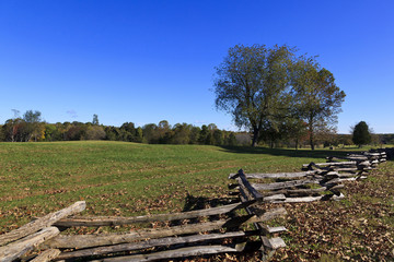 Fototapeta na wymiar Split Rail Fence and Field at Appomattox Court House National Park in Virginia
