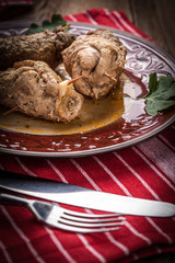 Tasty roulades beef on plate.