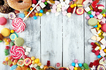 candies with jelly and sugar. colorful array of different childs sweets and treats