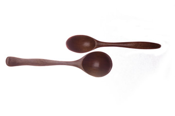 Wooden spoon on a white background