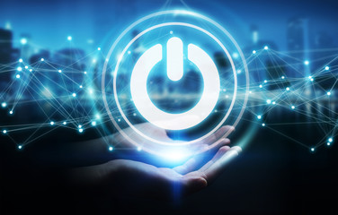 Businessman using 3D render power button with connections
