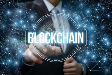 Businessman clicks on the block chain network.