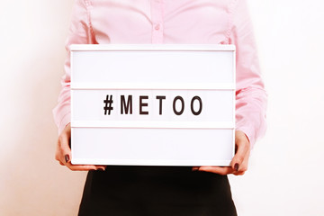 '#METOO' text in woman's hands. Female empowering movement concept.