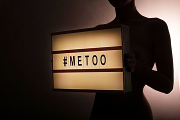 '#METOO' text in woman's hands. Female empowering movement concept.