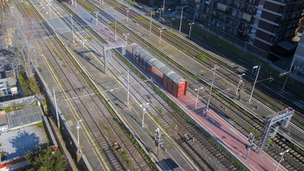 Aerial view of the Tuscolana station in Rome, in Italy. Around the rails there are the palaces and...