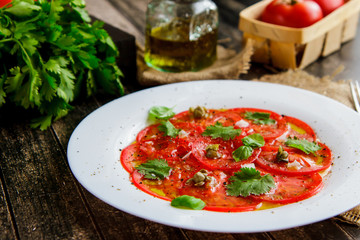 Carpaccio of fresh tomatoes and cilantro