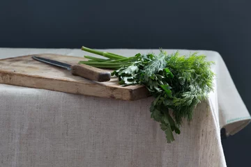 Green spices on the kitchen table © Galina Semenko