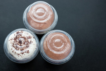 Assorted desserts for fast food, Panacota, mousse, from above