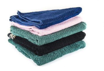 Medium towels for the bathroom and bath. Bath towels are stacked.