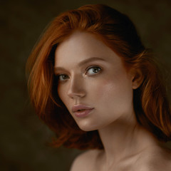portrait beautiful girl with perfect skin and red hair close-up
