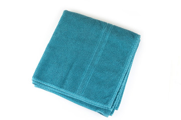 Medium towel for the bathroom and bath on the white