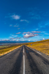 Obraz na płótnie Canvas Isolated road and Icelandic colorful landscape at Iceland,