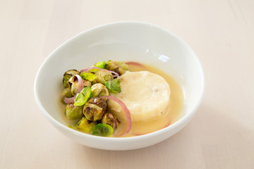 Sauerkraut topped with Grilled Sprouts
