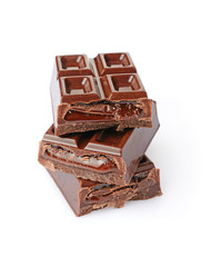 Close-up pieces of chocolate bar with filling of liquid chocolate