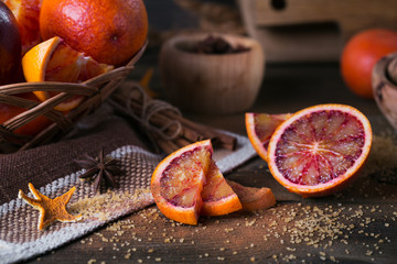 Fresh red orange fruit, anise, cinnamon and walnuts