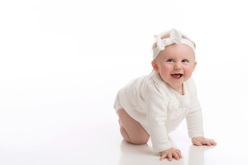 Laughing Baby Girl Wearing White