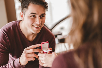 The happy man makes a proposal to his girlfriend