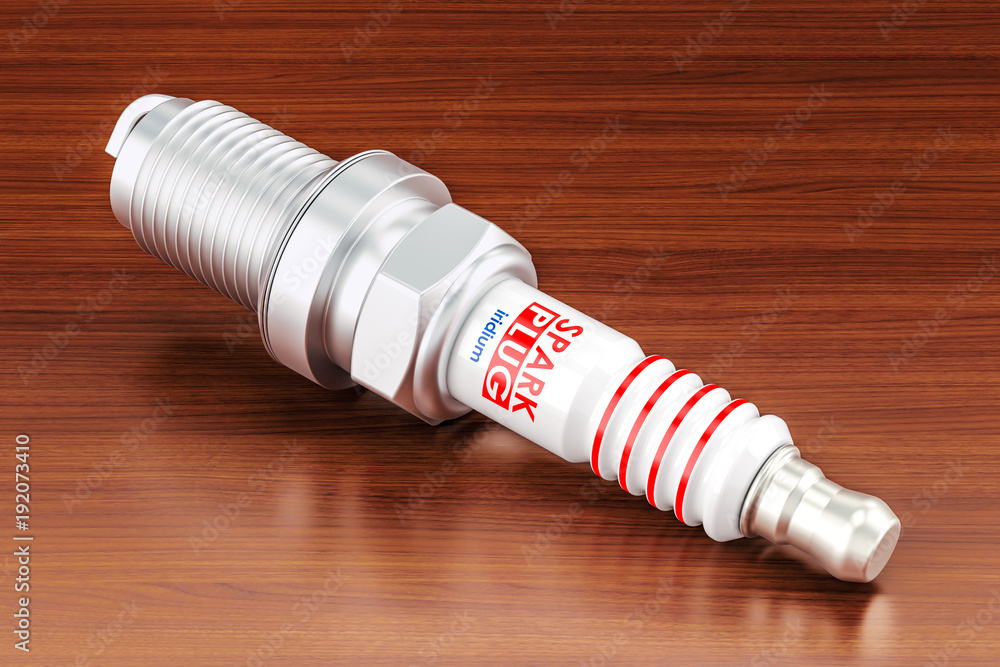 Poster spark plug on the wooden table. 3d rendering