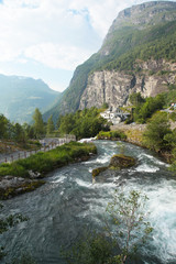 Fototapeta na wymiar Waterfall near Geirangerfjord