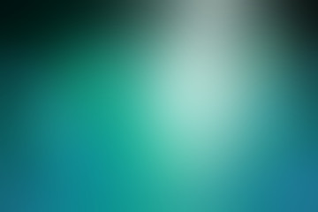 shiny elegant blurred blue and black background with spotlight shine, beautiful teal or turquoise color in smooth metal texture wallpaper layout