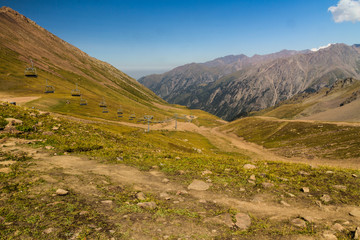 Fototapeta na wymiar Tien Shen Mountains from Shymbulak Upper Piste in Almaty, Kazakhstan