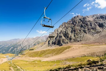 Fototapete Ski lift in Summer. Near Shymbulak Ski Resort Hotel in Almaty, Kazakhstan © Andy Chisholm