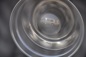 Van reflection in truck wheel
