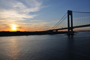 Naklejka na ściany i meble Bridge in the sunset