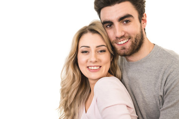 Obraz na płótnie Canvas The happy couple smile on the white background