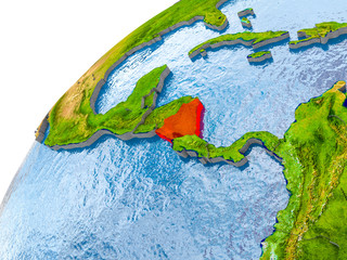 Map of Nicaragua in red on globe