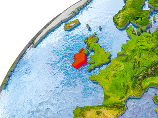 Map of Ireland in red on globe