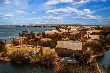 The Uros island from a boat on the Titicaca Lake, Peru