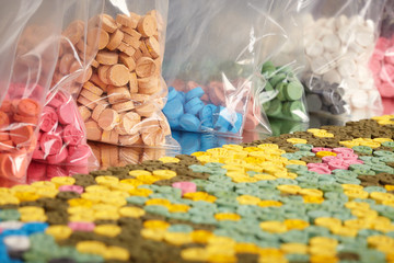Thousands of pills of MDMA (Extasy) distributed by drug dealer seized by legal authority - obrazy, fototapety, plakaty