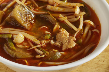 A bowl of the Thai classic, Tom Yum soup with chicken