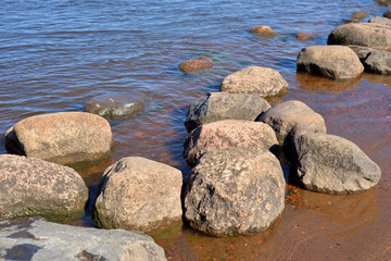 Fototapeta na wymiar Water and rocks.