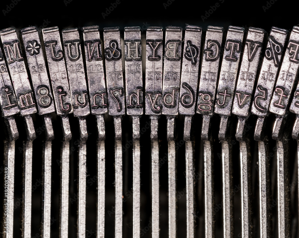 Fototapete macro detail of typescript inside electric typewriter