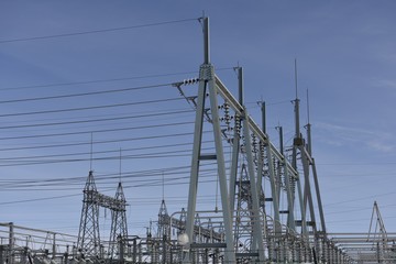 Electrical grid high voltage substation metal infrastructure in South Dakota / USA.