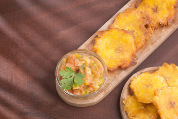 Fried plantain tostón. Patacon - Musa × paradisiaca