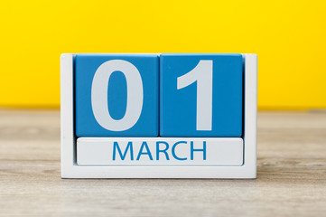 March 1st. Day 1 of march month, color calendar on yellow background. Spring time