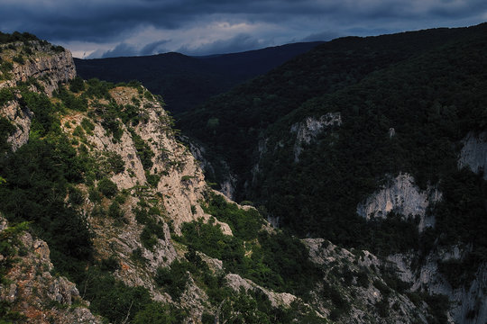 Beautiful scenery with mountains with green forest and blue sky. The Mount Boyka over theCrimia Grand Canion. Popular mystical place