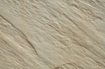 Closeup on ceramic tile detailed surface rough marbled textured background