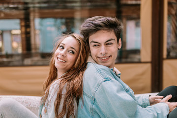 Couple in love having a good time. Couple having fun. Young lovers enjoying a sunny day.