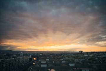 Fototapeta premium Sunset in a city. Horizon with sunset. Skyline