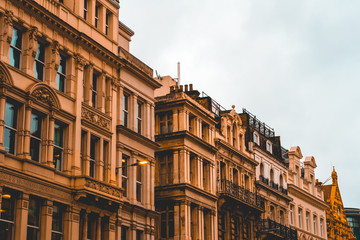 Fototapeta na wymiar orange apartment houses from exterior view at london