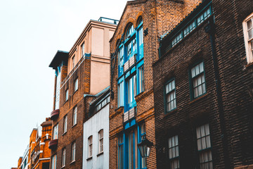 some old industrial brick buildings in a row