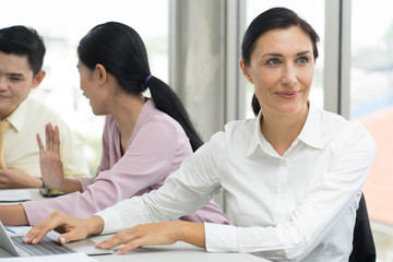 Obraz premium Modern business old woman in the office with copy space.