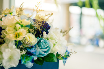 Rose fake flower and Floral background. rose flowers made of fabric. The fabric flowers bouquet. Colorful of decoration artificial flower