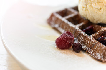 Fresh waffles chocolate topped with ice cream