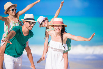 Portrait of happy family on the beach