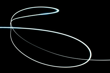 White Color Light Painting Photography Over Black Background